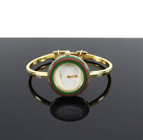 gucci bangle watch with interchangeable rings|gucci vintage watch changeable bezel.